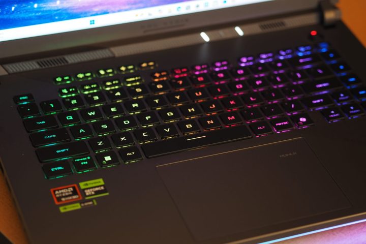Asus ROG Strix G16 Review: Fast, Affordable Gaming Laptop Explored 7 Asus ROG Strix G16 top down view showing keyboard and RGB lighting.