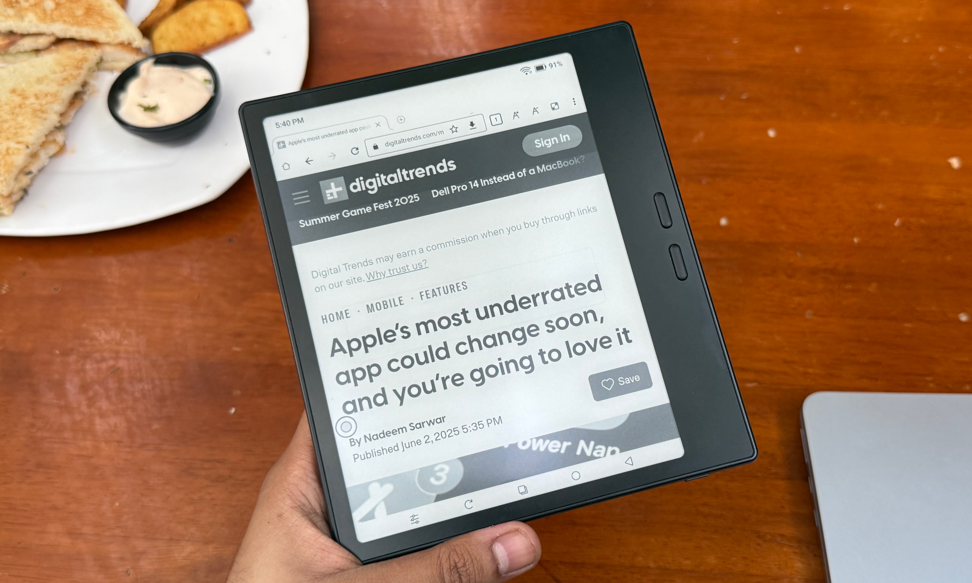 Pocketable Note-Taking Tablet: The Ultimate Kindle Alternative 7 Reading a web article on the Boox Go 7 E Ink tablet.