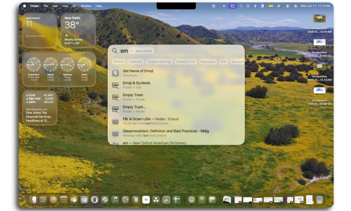 Apple’s Spotlight Update: The Top Upgrade in macOS Tahoe 9 Navigating with Spotlight on a MacBook Air featuring macOS Tahoe.