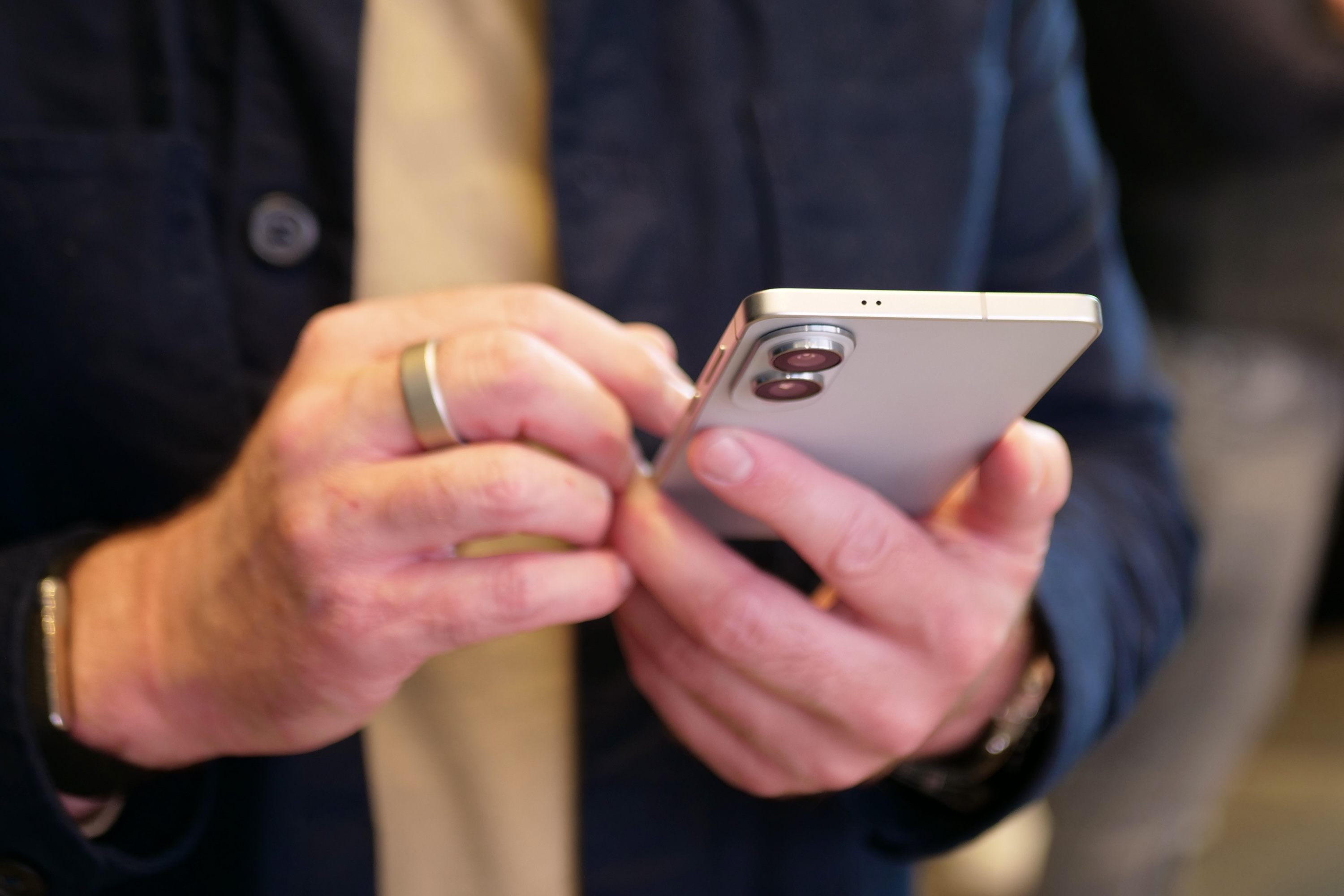Exploring the Galaxy S25 Edge: More Experimental Than You Think 6 A person holding the Samsung Galaxy S25 Edge.