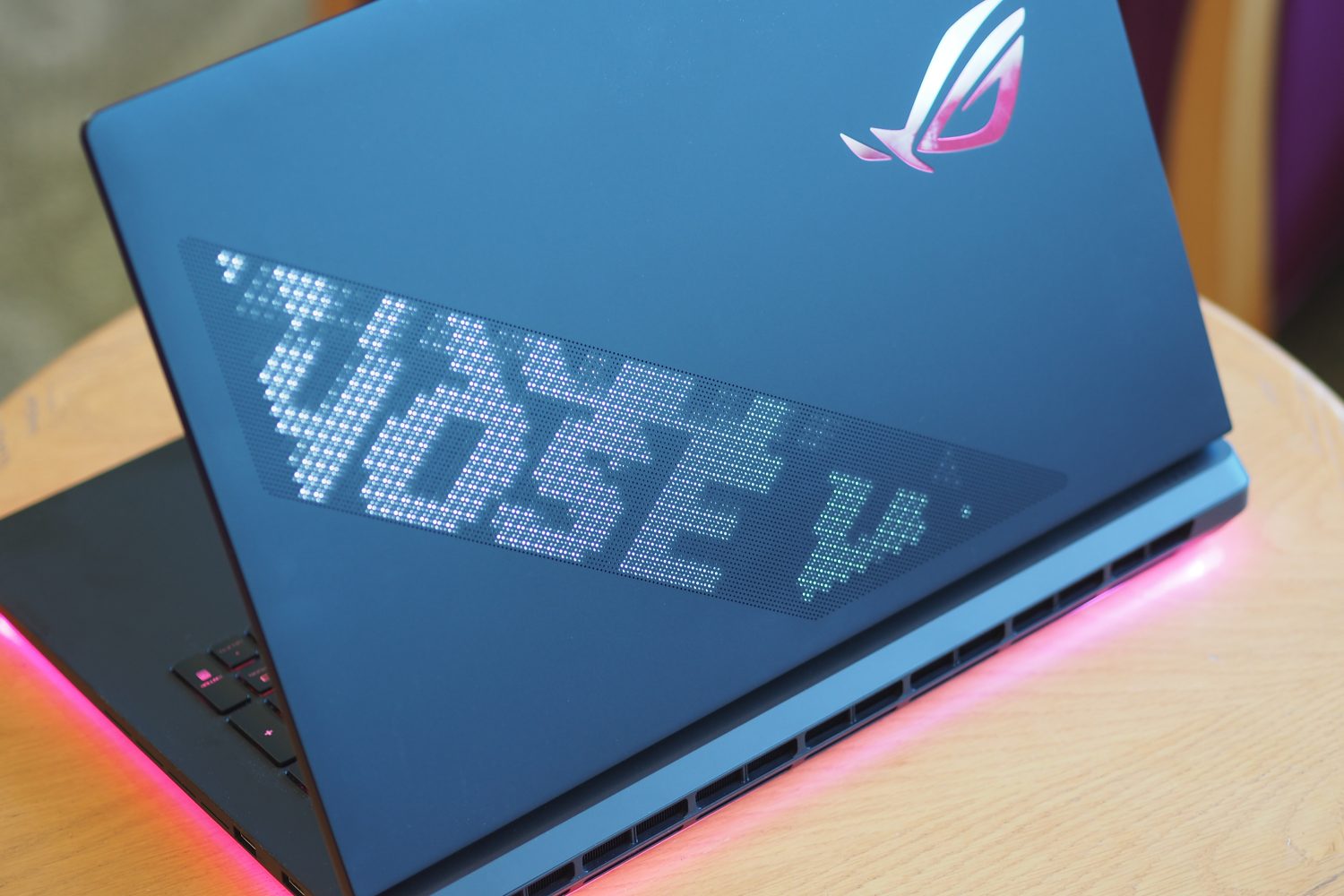 Top 3 Reasons to Choose the Asus ROG Strix SCAR 18 Gaming Laptop 7 Asus ROG Strix SCAR 18 2025 rear view showing AniME and RGB lighting.