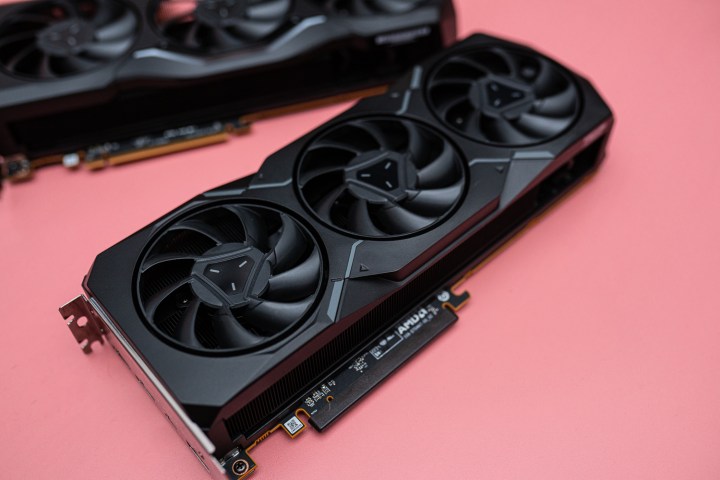 Why AMD’s Timing is Right for a New Flagship GPU Launch 9 RX 7900 XTX and RX 7900 XT on a pink background.