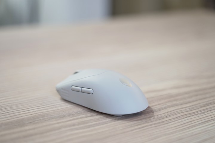 Ultimate Guide to Buying the Best Gaming Mouse in 2025 9 The Alienware Pro Wireless Mouse on a wooden table.
