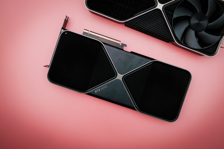 Unlock Hidden Performance: AMD GPUs Get Unexpected Boost 7 The RTX 5090 sitting on a pink background.