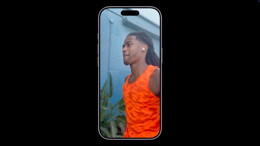 iPhone 17 Revolutionizes Selfies: Solving the Age-Old Problem 7 Man jogging while recording himself with an iPhone 17 front camera