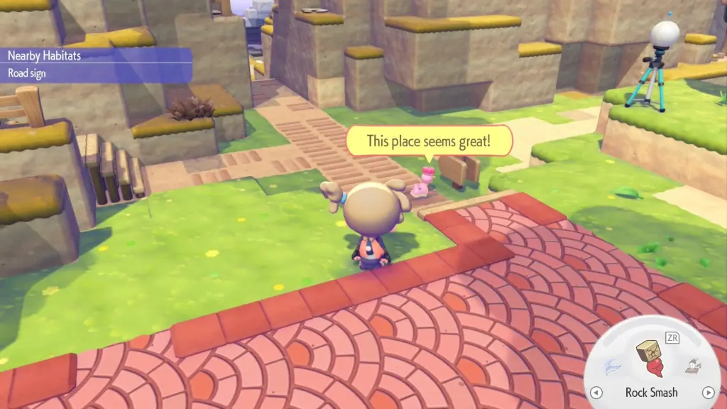 How to Get Shellos in Pokopia: Locations & Tips 6 A pink Shellos looks at a signpost and says "This place seems great!"