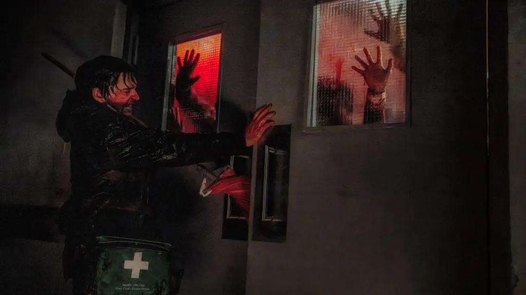 Resident Evil Movie: Release Date, Plot, Cast & Details 6 Bryan holding off the zombies in the new Resident Evil movie